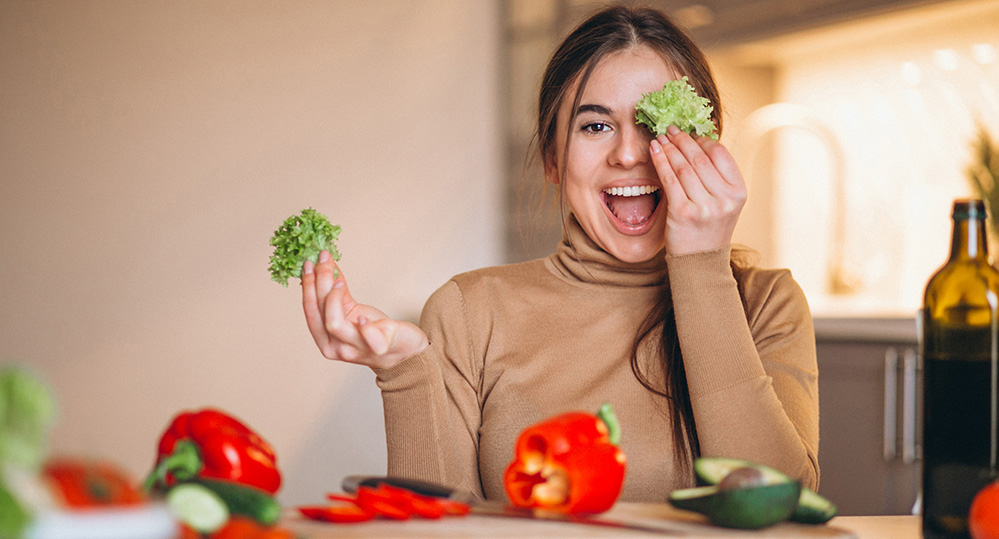 Woman cooking at kitchen